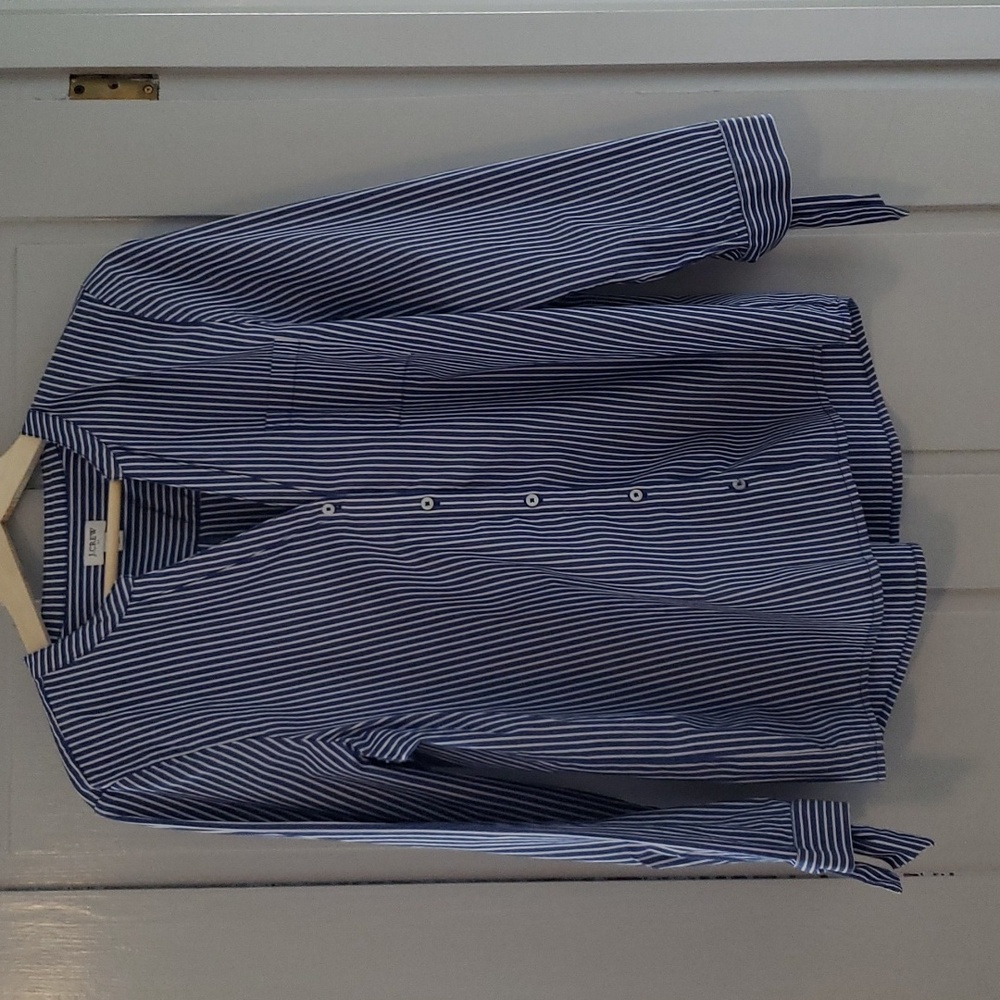 Blue and white striped button down shirt with ties on the cuff!
